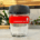 Keepcup on a grey table and plants in the background